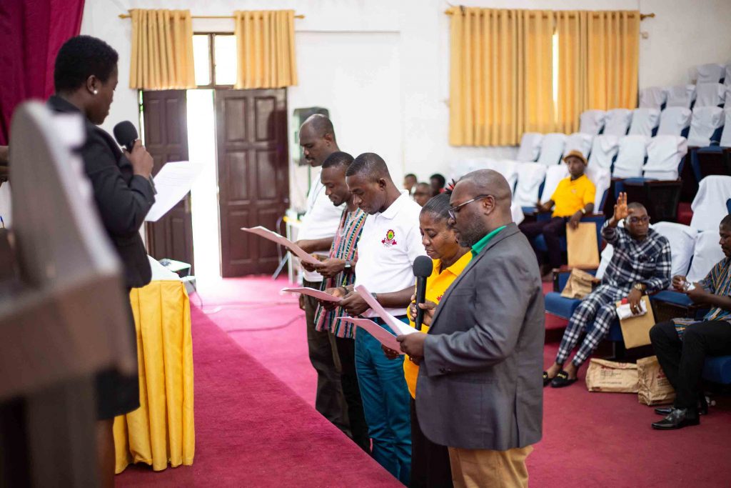 The newly elected executives being sworn-in by the Chairman of the Judicial Committee, Lawyer Mrs. Gertrude Acheampong