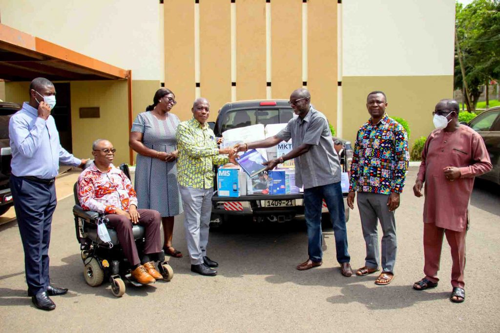 Prof. Akoto donating the  books to the University