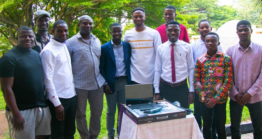 The Manager of MYND FM, Mr. Richmond Butler( fourth left) in a group photograph with SRC Executives at the handover ceremony